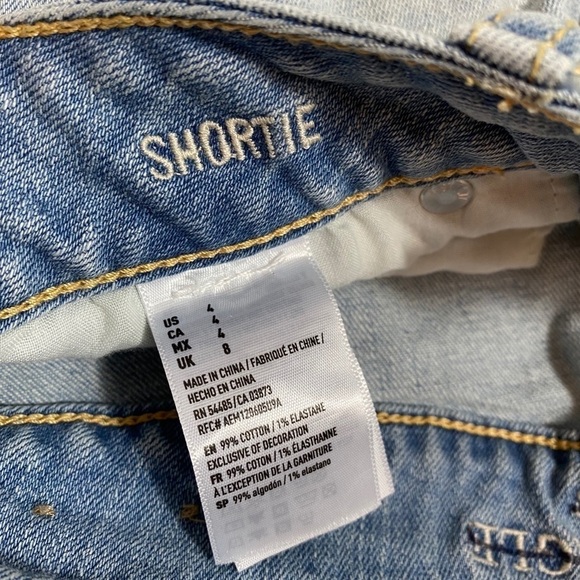 AE 4 shortie pom pom fringe distressed jean shorts - Picture 6 of 8